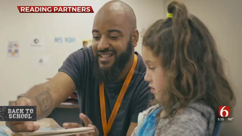 screenshot from video showing tutor-student pair